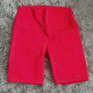 Neon Pink alo biker shorts.